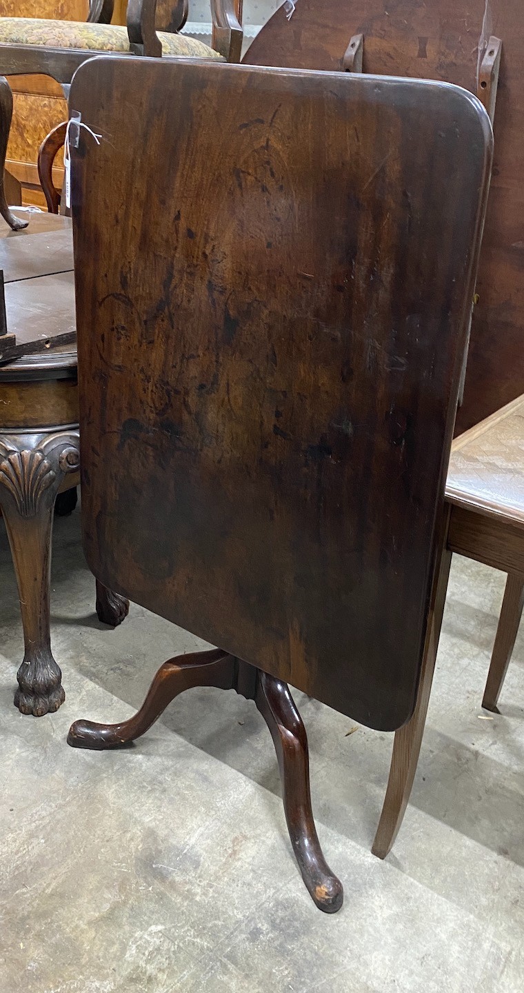 A George III mahogany rectangular tilt top tea table, width 90cm, depth 69cm, height 72cm